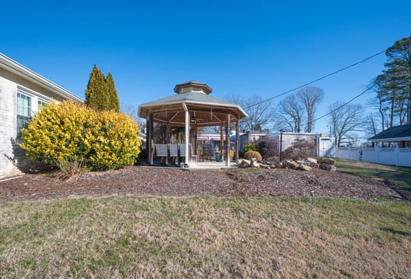 Outdoor gazebo in a landscaped area
