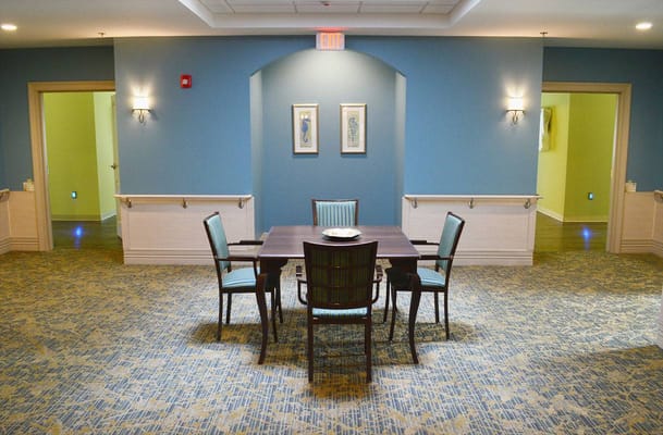 Bright common area with seating and artwork