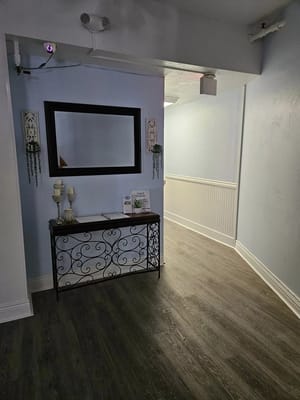 Brightly lit hallway with decorative elements