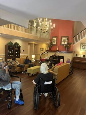 Residents socializing in a spacious common area