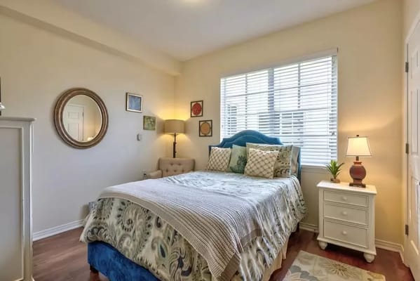 A cozy bedroom in the assisted living facility