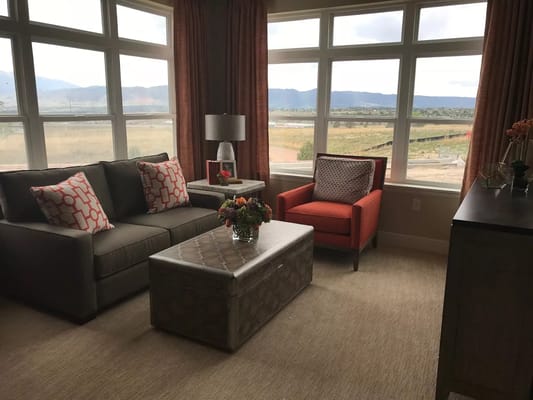 Bright interior living area with mountain views