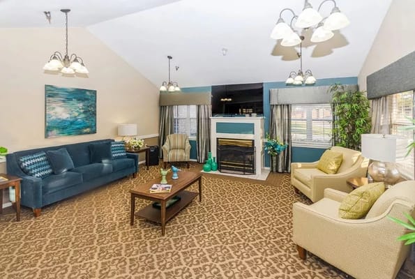 Cozy common area with seating and fireplace