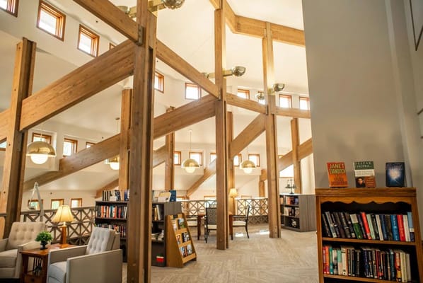 Bright interior of a cozy library with bookshelves