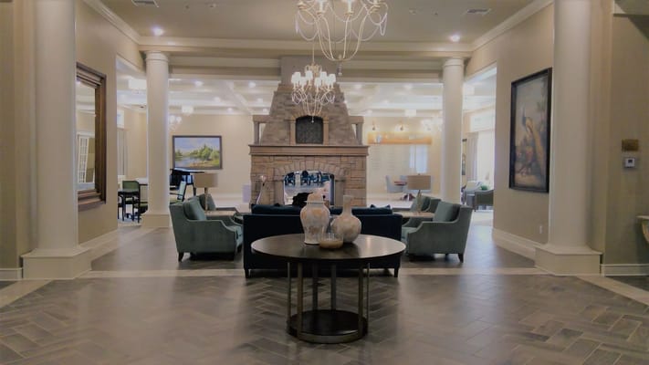 Interior lobby with comfortable seating and a fireplace