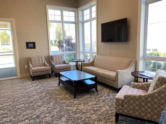 Interior lounge area with seating and TV