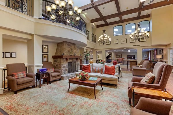 Interior common area with comfortable seating and a fireplace