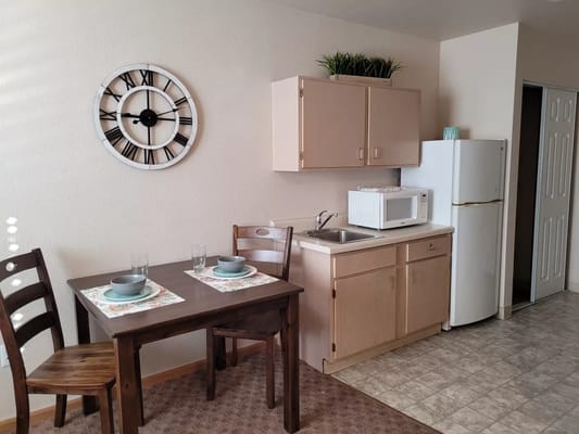 A cozy kitchen area in a resident room