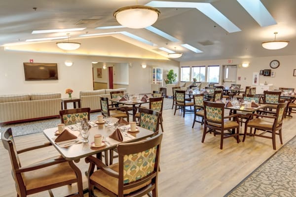Dining room with tables set for meals