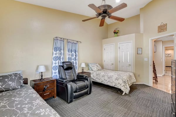 Cozy interior room with two beds and seating