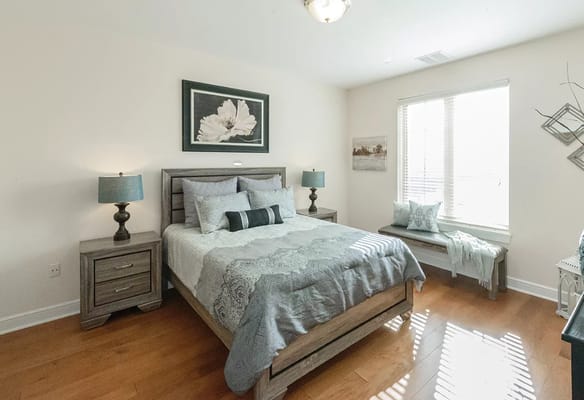 Well-decorated bedroom with a bed and natural light