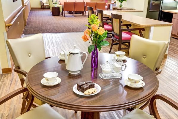 Dining table set with tea and snacks