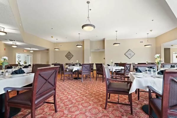 Dining room with elegant table settings and decor