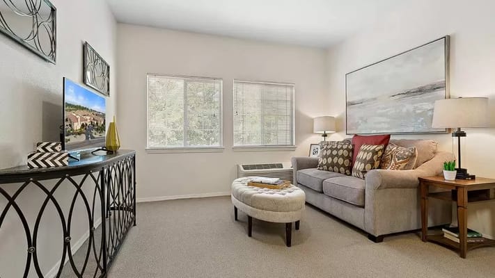 Cozy common area with a couch and artwork