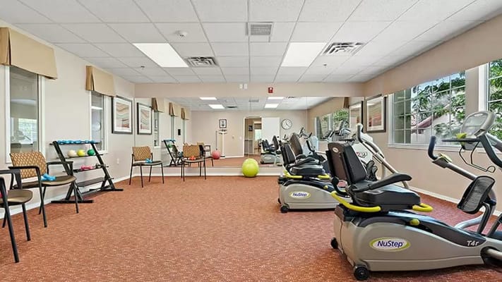 Interior view of a fitness room with exercise equipment