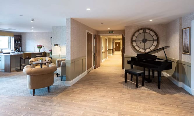 Interior common area with seating and a piano