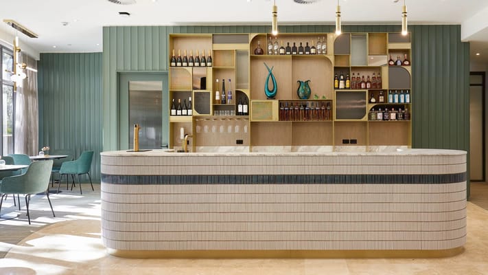Modern interior bar area with shelves and seating