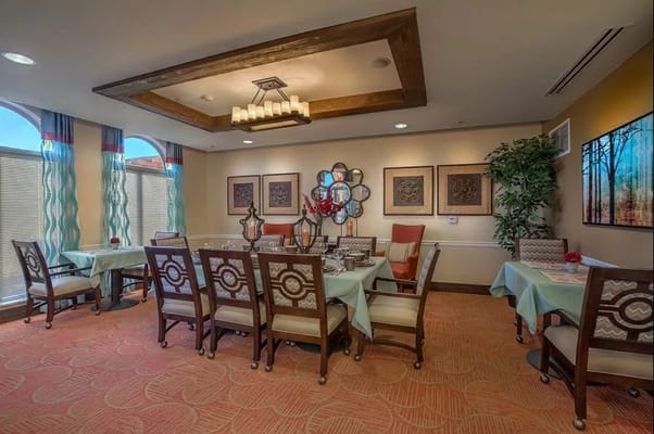 Activity room setup with tables and chairs