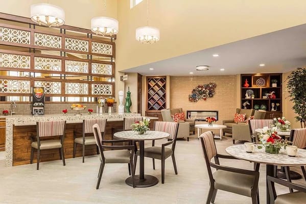 Bright common area with seating and decor