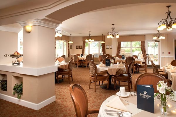 Cozy dining room with elegant tables and chairs