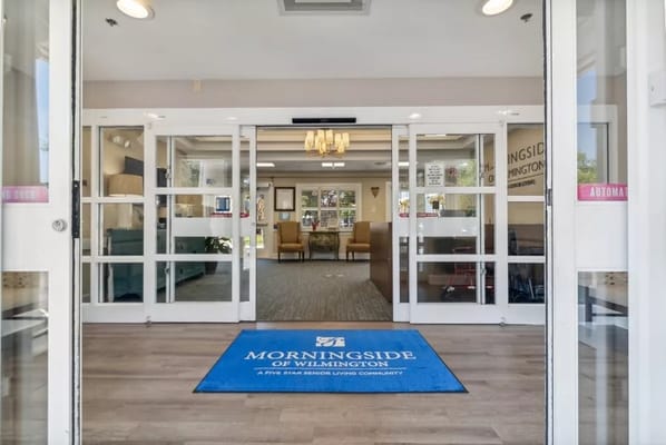 Entrance lobby of Morningside of Wilmington with a welcome mat