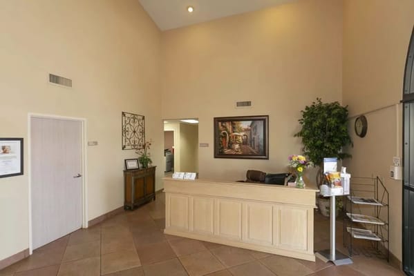 Reception area of the care center with floral arrangements