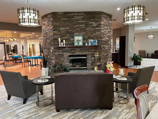 Cozy lounge area with fireplace and seating