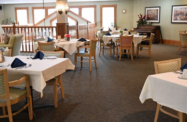 Dining area setup with tables and chairs