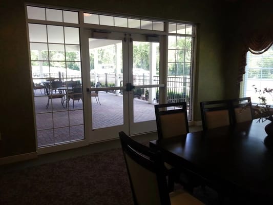 View from the dining area to the patio through glass doors