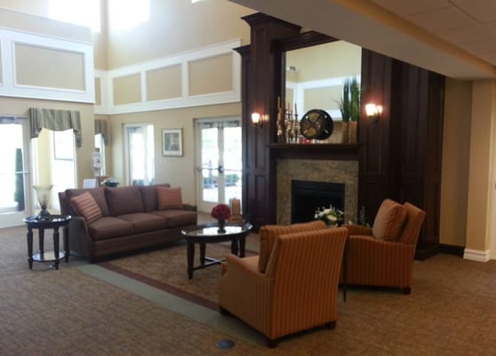 Interior living area with seating and a fireplace