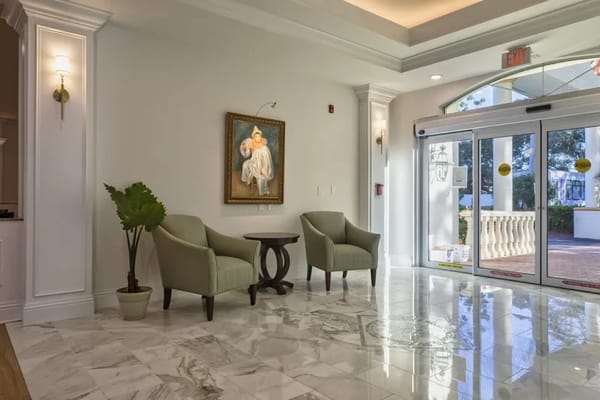 Bright interior lobby with seating and artwork