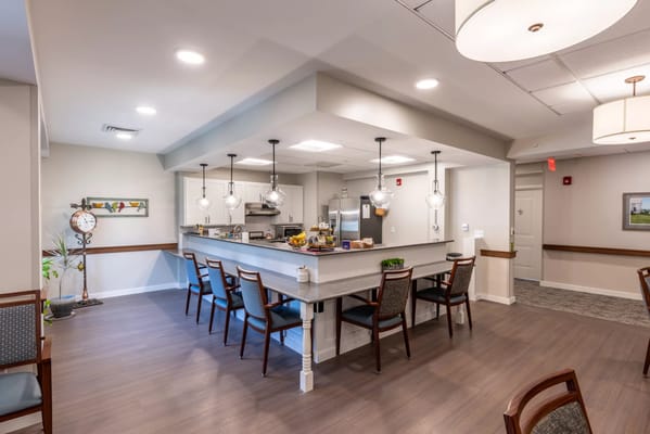 Bright interior common area with seating and decor