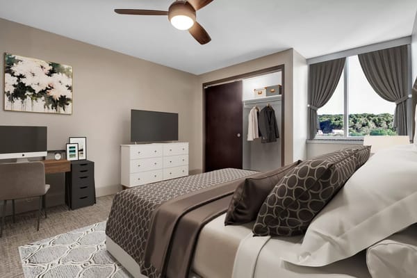 Well-furnished resident bedroom with modern decor