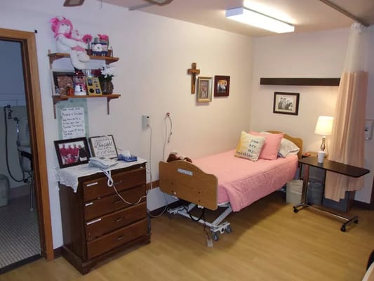 Cozy resident room with personal touches and decorations