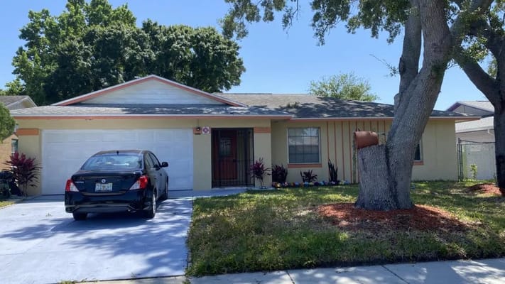 Front view of O.S.J Family Place in Orlando, FL.