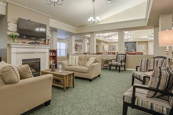 Interior view of a cozy common area with seating