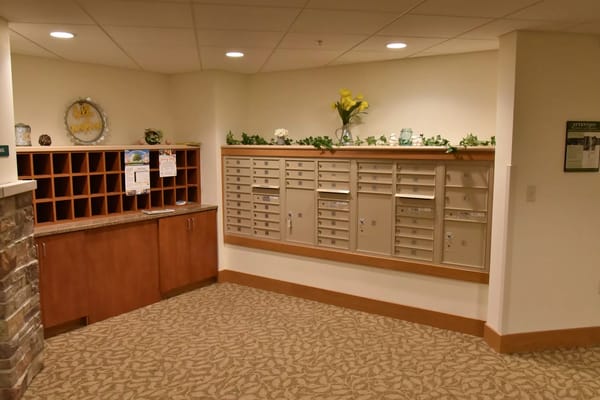 Interior view of a mail area with mailboxes