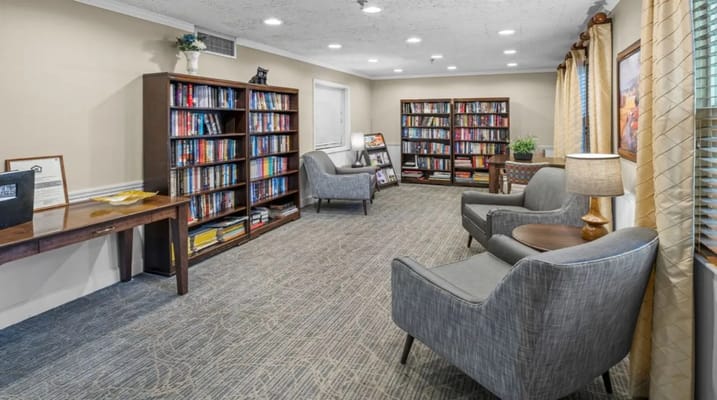 Bookshelves and seating in the library area