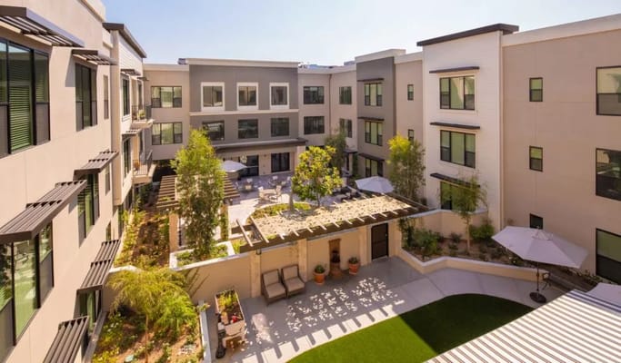View of the landscaped courtyard with seating areas.