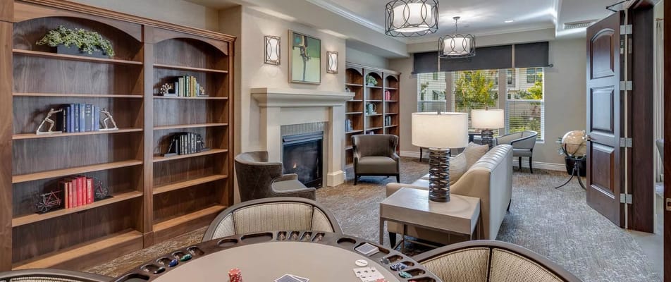 Common area with bookshelves and seating