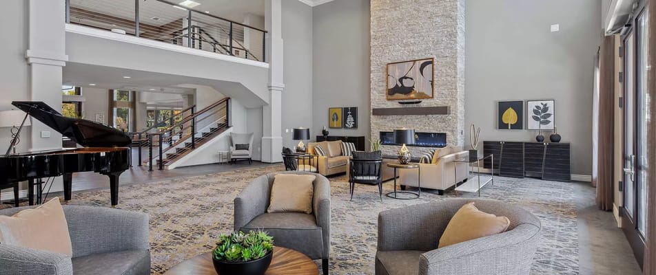 Bright, spacious lobby with comfortable seating and decor
