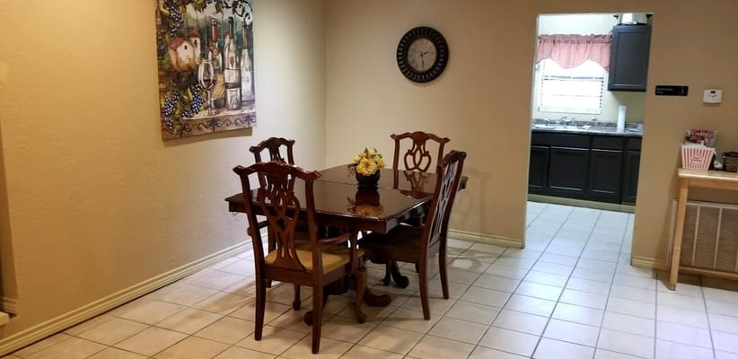 Cozy dining area with a table and chairs