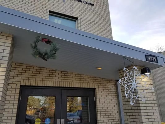 Entrance of Omaha Nursing and Rehabilitation facility decorated for the holidays