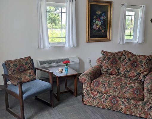 Cozy seating area in a resident's room