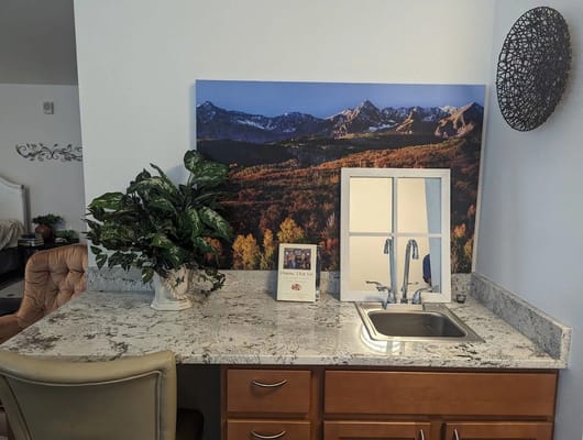 Interior view of a kitchenette with decorative elements