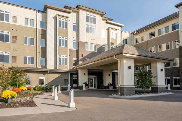 Entrance of Orchards of Minnetonka Senior Living with landscaping