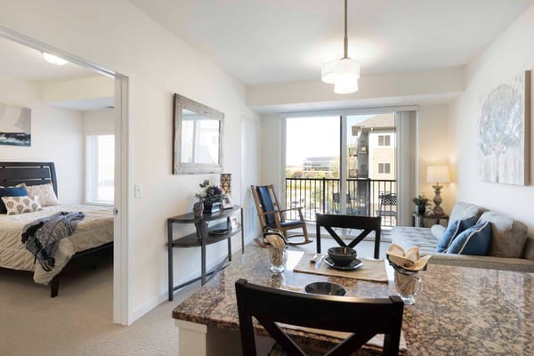 Bright interior of a senior living apartment with a view