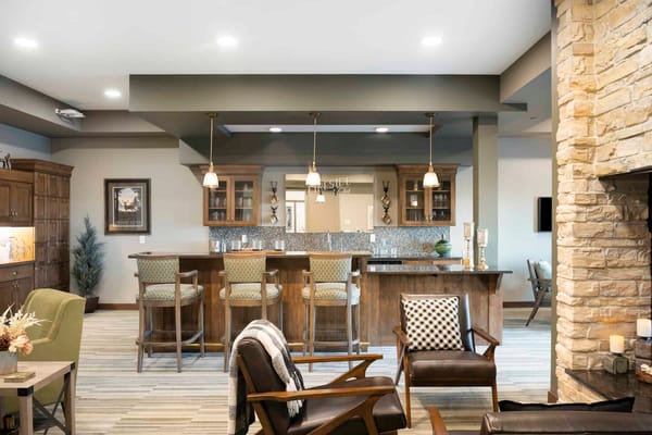 Bright common area with seating and bar