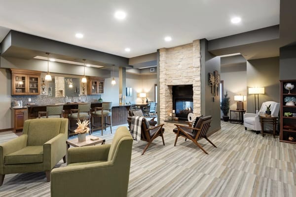 Common area with seating and a fireplace