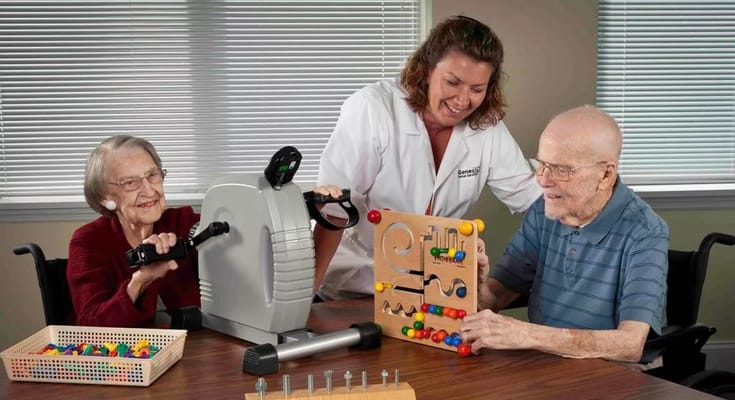 Residents engaging in therapeutic activities with staff